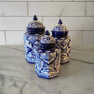 Talavera Blue & White Canister Set | Mexican Handmade Pottery - three hand-painted blue and white Talavera ceramic canisters on marble counter