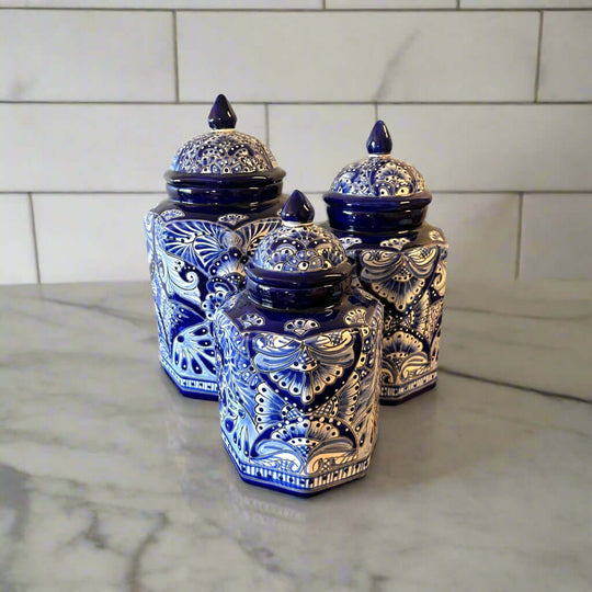 Talavera Blue & White Canister Set | Mexican Handmade Pottery - three hand-painted blue and white Talavera ceramic canisters on marble counter