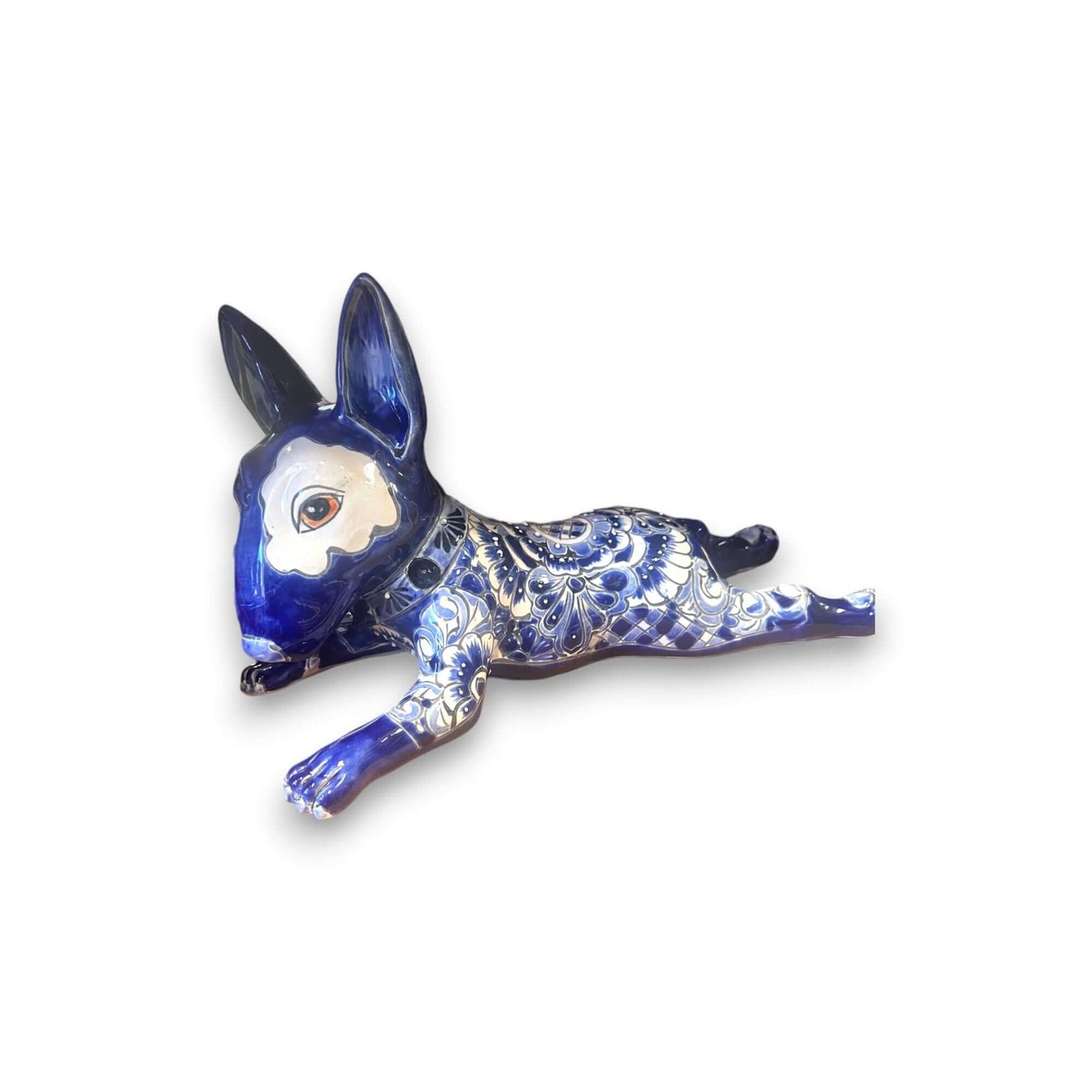 Talavera Bull Terrier Statue | Hand-Painted Colorful Dog Sculpture – blue and white hand-painted Talavera bull terrier with red eye patch, kiln-fired, Guanajuato