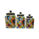 Talavera sunflower and butterfly canister trio shown against a white background