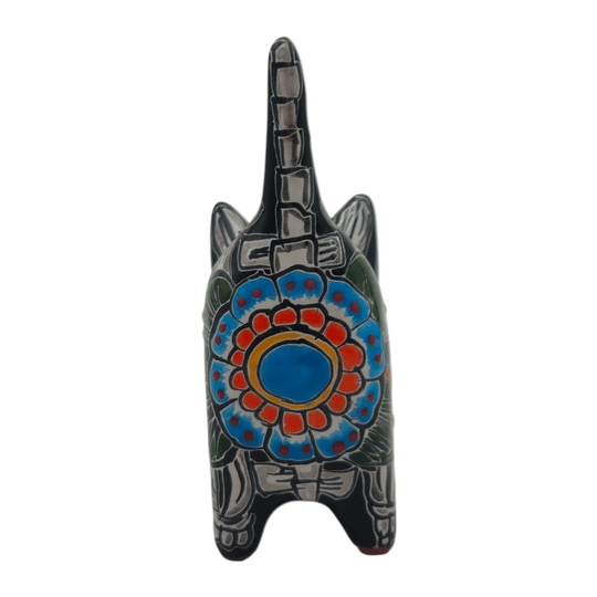 Back view of a Talavera cat planter showing its tall tail and colorful pattern