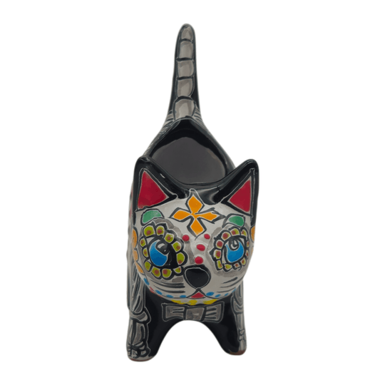 Front view of a Talavera cat planter with expressive eyes and decorative details
