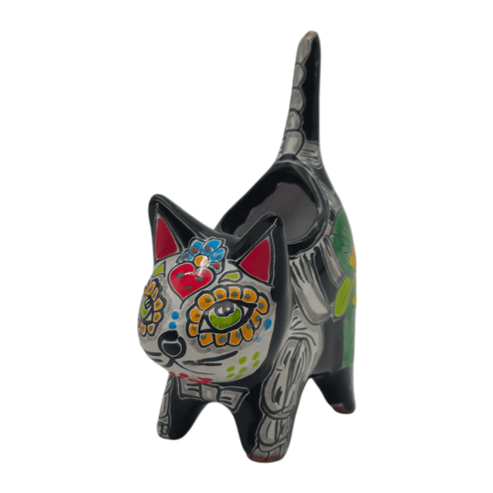 Three-quarter view of a multicolor Talavera cat planter on a white background
