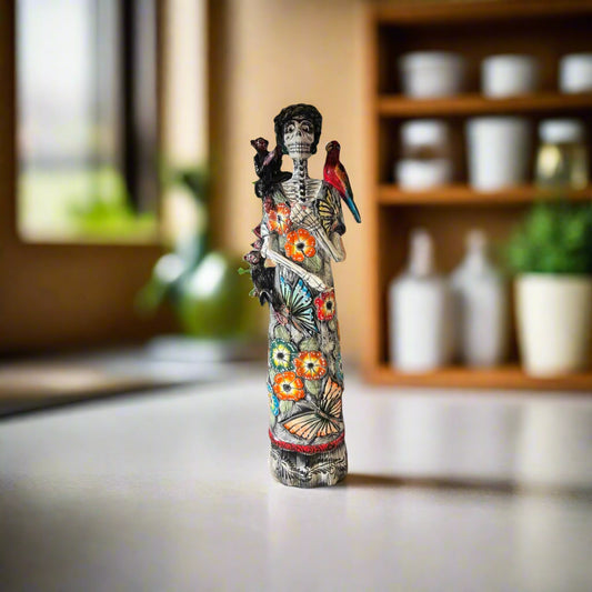 Talavera Catrina Figurine | Day of the Dead Skeleton with Monkey & Bird handcrafted hand-painted Talavera Catrina with parrots and floral gown