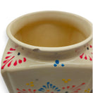 Talavera Ceramic Kitchen Canister Trio | White Multicolor Set close-up of handcrafted white canister with multicolor floral motifs and small rim chip