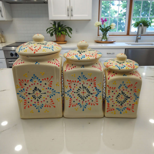 Talavera Ceramic Kitchen Canister Trio | White Multicolor Set on white countertop with floral geometric motifs