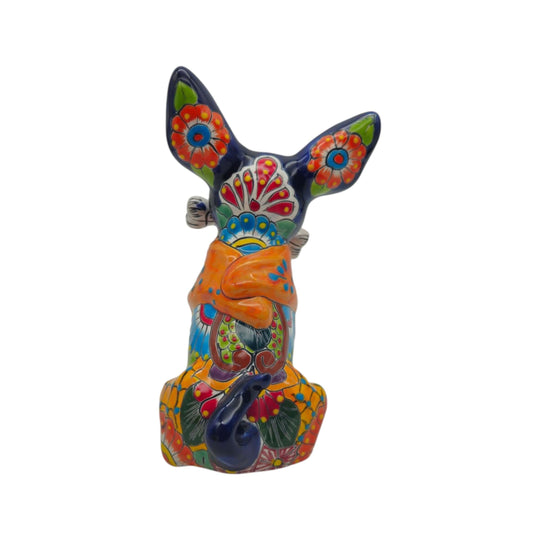 Colorful Talavera Chihuahua dog statue with floral patterns and a bone