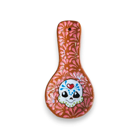 Colorful Talavera Skull Spoon Rest | Mexican Kitchen Art - hand-painted pink floral spoon rest with cheerful skull motif
