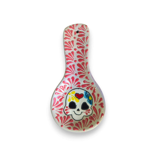 Colorful Talavera Skull Spoon Rest | Mexican Kitchen Art - hand-painted Talavera spoon rest with cheerful skull and pink floral bursts