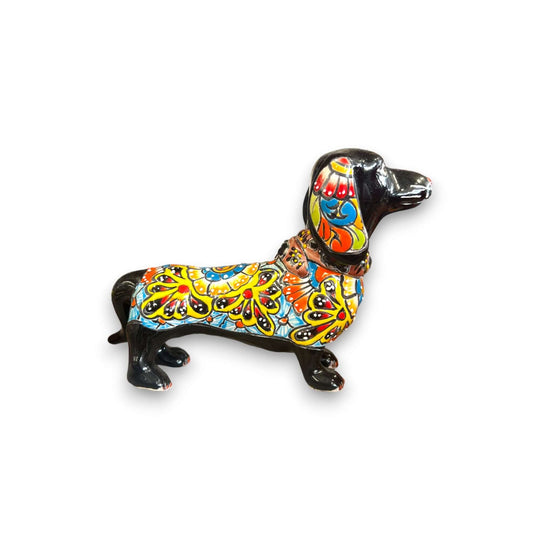 Talavera Dachshund Statue | Colorful Hand-Painted Dog Figurine - hand-painted Mexican ceramic dachshund with green base and peach floral details