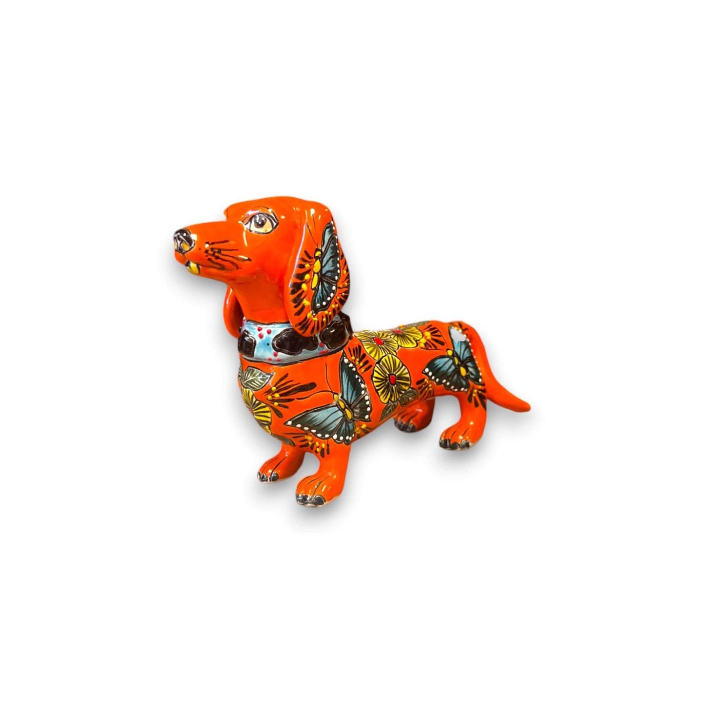 Talavera Dachshund Statue | Colorful Hand-Painted Dog Figurine - orange Talavera dachshund with hand-painted floral and butterfly motifs