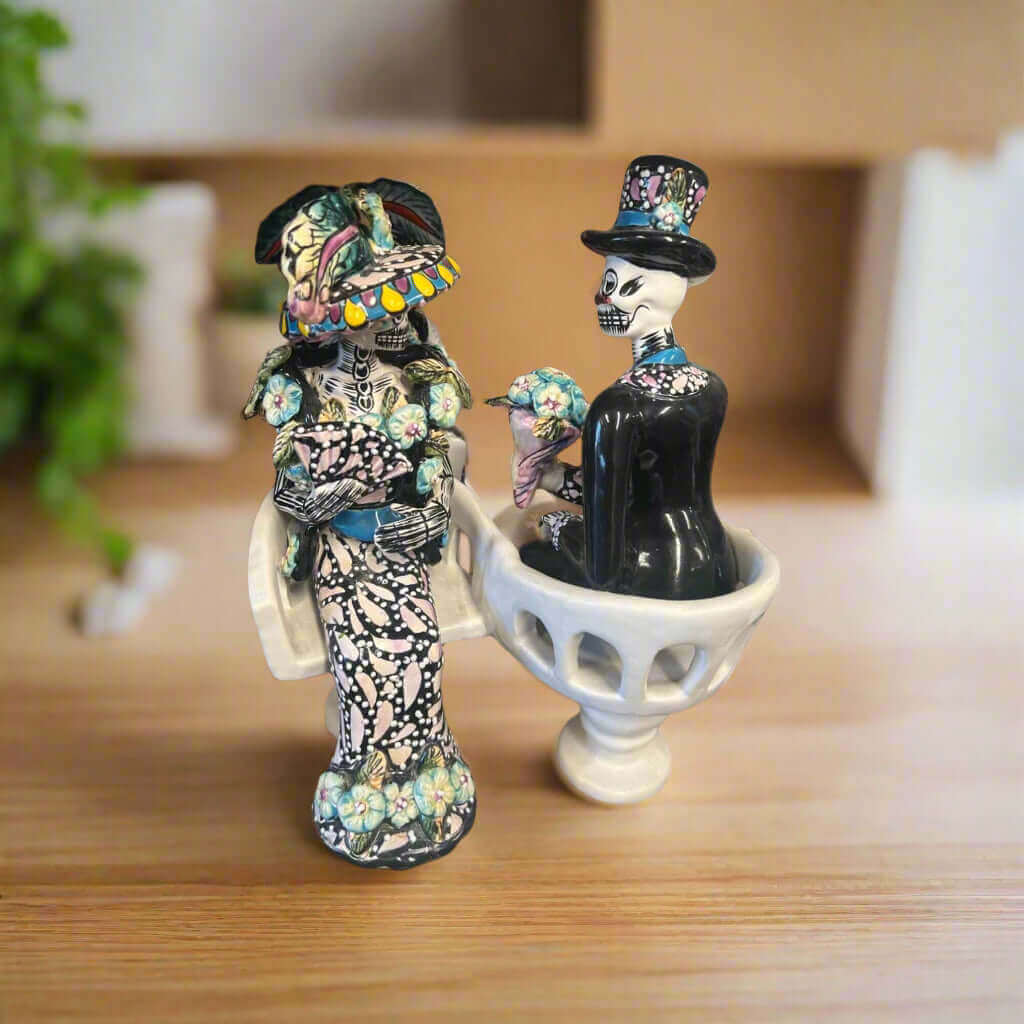 Talavera Day of the Dead Figurines | Mexican Chair Statues - hand-painted Talavera skeleton couple in chairs, handcrafted in Guanajuato, Mexico