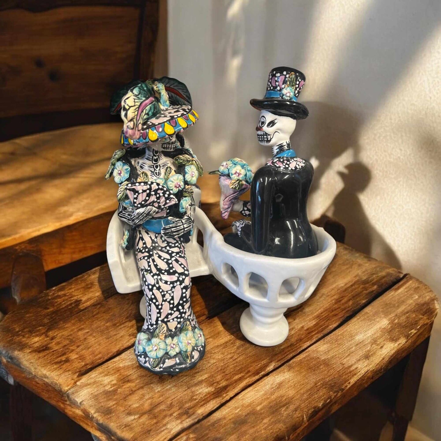 Talavera Day of the Dead Figurines | Mexican Chair Statues hand-painted Talavera skeleton couple seated in decorative chairs