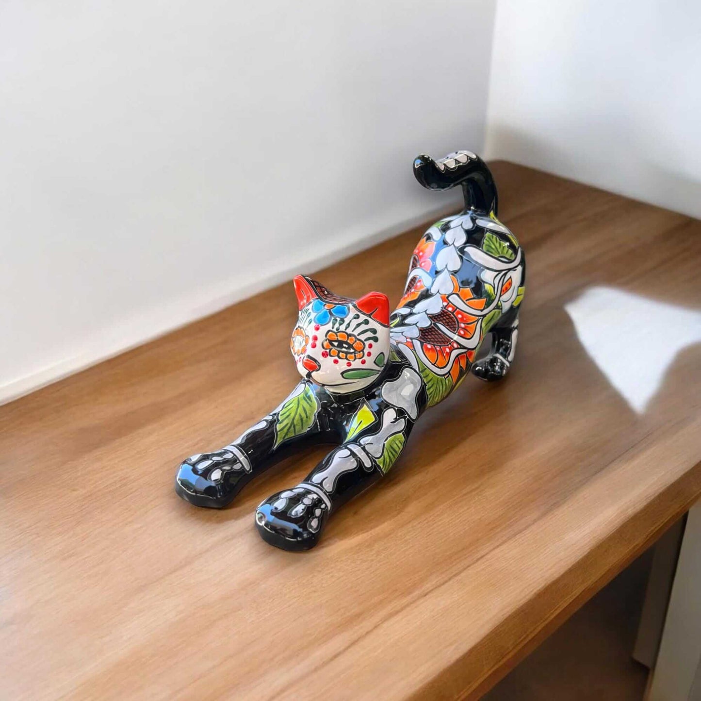 Talavera Stretching Cat Figurine | Mexican Day of the Dead Art - handpainted orange green black floral skeletal cat decor