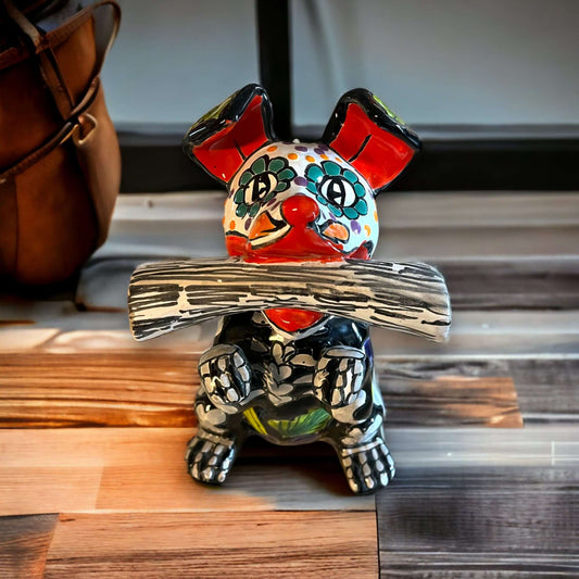 Talavera Day of the Dead Dog | Handcrafted Mexican Pottery Statue (Medium) vibrant hand-painted skull-patterned ceramic dog holding log