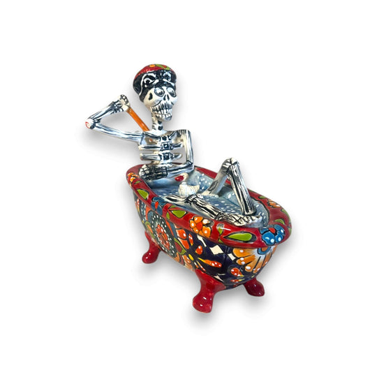 Talavera Skeleton Figurine | Day of the Dead Bathtub Statue – hand-painted Talavera skull in colorful clawfoot tub, silver-toned skeleton lounging