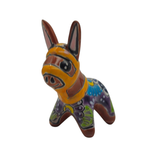 Talavera donkey figurine with orange, purple, blue, green, and brown details