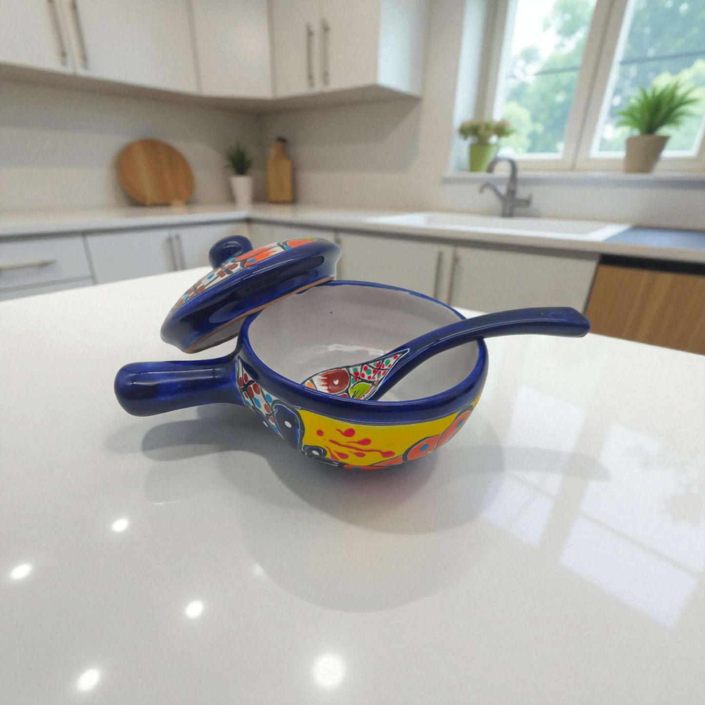 Talavera Salsa Bowl with Lid | Hand-Painted Ceramic Salsera - vibrant hand-painted multicolor covered salsa bowl with spoon on kitchen counter