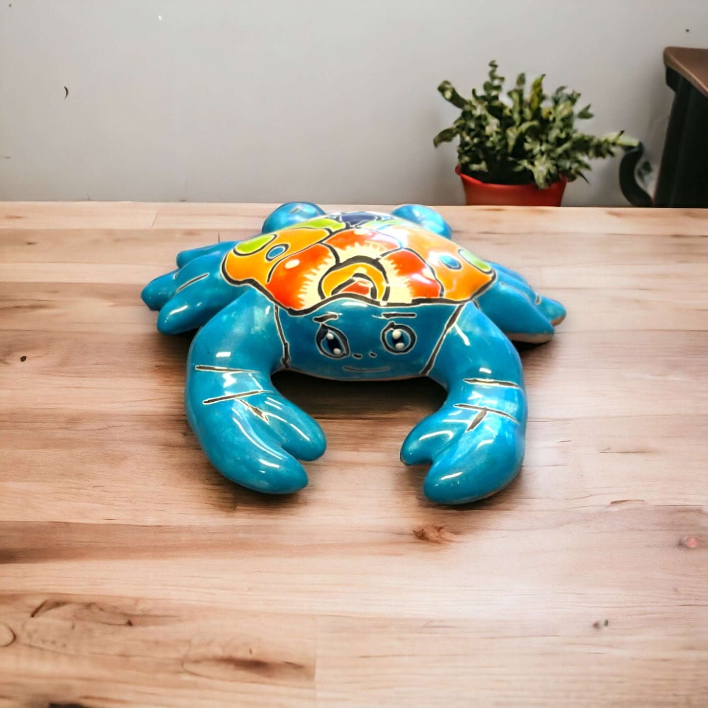 Talavera Crab Figurine | Colorful Hand-Painted Mexican Sculpture - bright blue hand-painted Talavera crab on wooden table