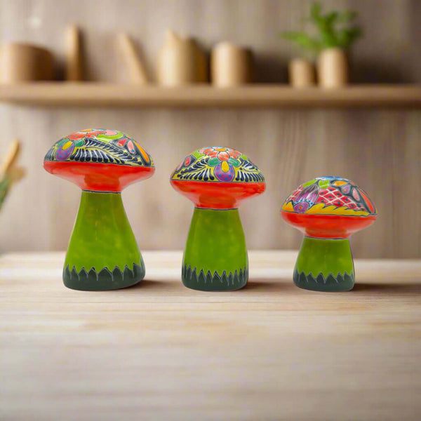 Talavera Mushroom Set | Vibrant Hand-Painted Mexican Decor - trio of brightly painted hand-painted Talavera ceramic mushrooms on wooden table