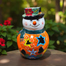 Talavera Snowman Figurine | Festive Hand-Painted Holiday Art - hand-painted orange snowman with star cutouts, green scarf, floral hat, kiln-fired from Guanajuato