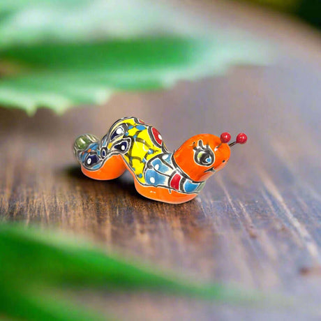 Talavera Caterpillar Art | Handcrafted Mexican Ceramic Figurine small hand-painted orange Talavera caterpillar figurine with multicolor floral patterns