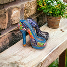 Talavera High Heel Statue | Colorful Handmade Mexican Decor - hand-painted Talavera ceramic high heel on wooden bench