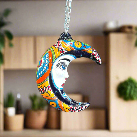 Talavera Crescent Moon Face | Hanging Mexican Wall Art hanging hand-painted colorful crescent moon face ornament, bold reds and blues, kiln-fired lead-free glaze
