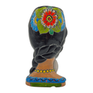 Back view showing floral details on a Talavera lady and bunny planter