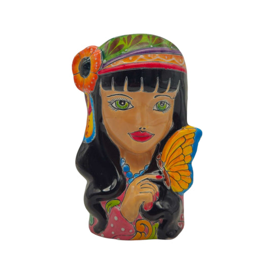Angled view of the hand-painted Talavera lady head planter