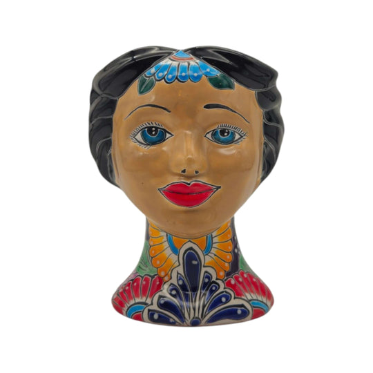 Front view of a Talavera lady head planter with blue eyes and floral details
