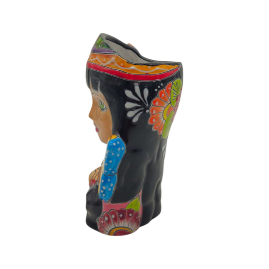 Side and back view of a colorful Talavera lady head planter