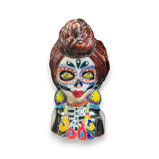 Talavera Skull Lady Planter | Colorful Day of the Dead Art hand-painted female skull planter with red bun, vivid blue yellow green patterns