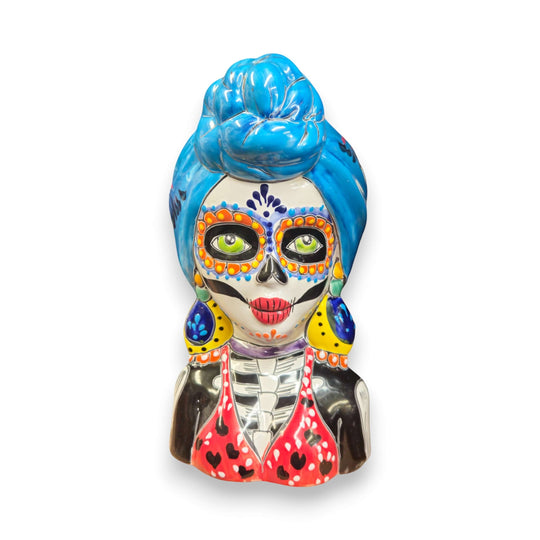 Talavera Skull Lady Planter | Colorful Day of the Dead Art - hand-painted Talavera lady skull planter with blue bun, vivid red blue yellow green patterns