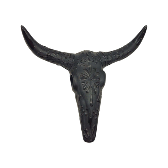 Front view of matte black Talavera longhorn wall art with raised decorative details