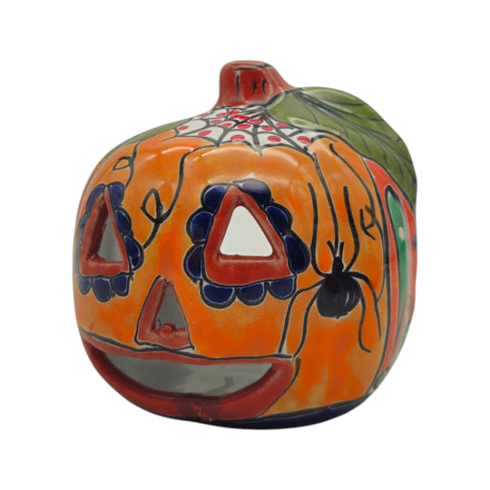 Side view of an orange Talavera Jack-O'-Lantern pumpkin with leaf and spider details