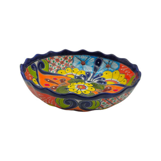 Front view of a colorful hand-painted Talavera scalloped bowl