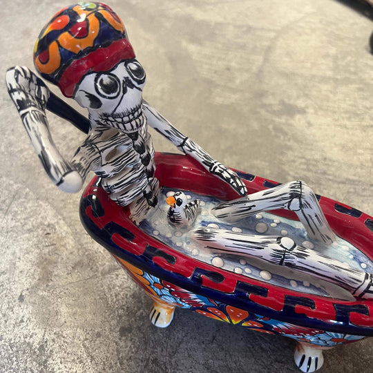 Talavera Skeleton Figurine | Day of the Dead Bathtub Statue hand-painted Talavera skull in colorful floral clawfoot tub, Guanajuato artisan piece