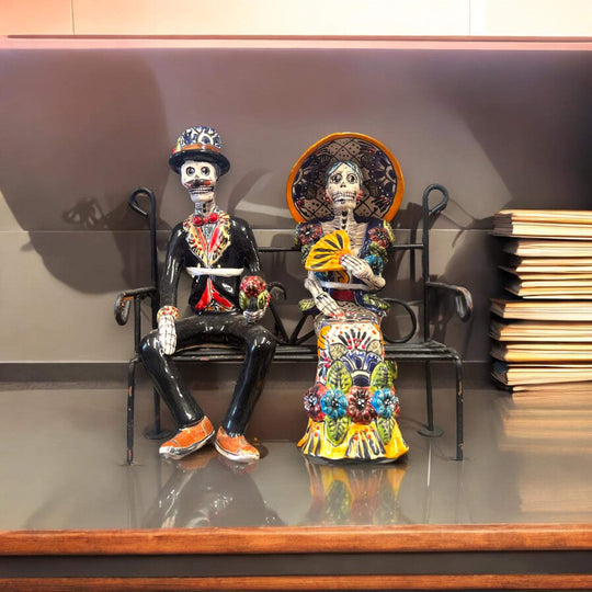 Talavera Skeleton Couple on Bench | Day of the Dead Mexican Decor - hand-painted Talavera skeleton couple on wrought iron bench