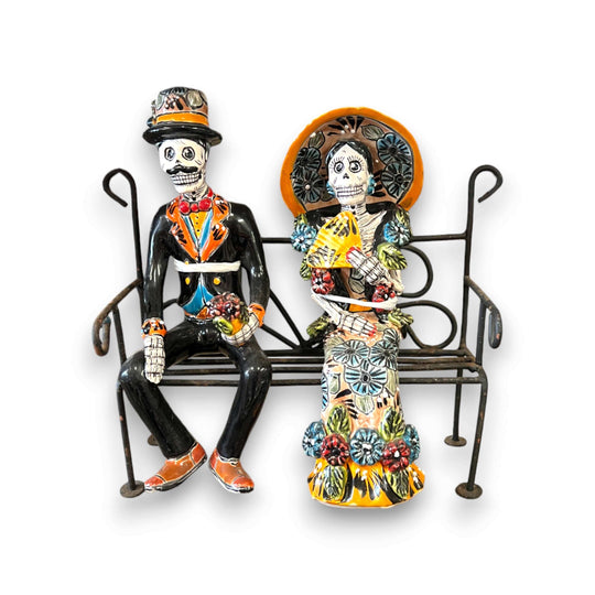 Talavera Skeleton Couple on Bench | Day of the Dead Mexican Decor hand-painted Talavera skeleton couple seated on wrought iron bench