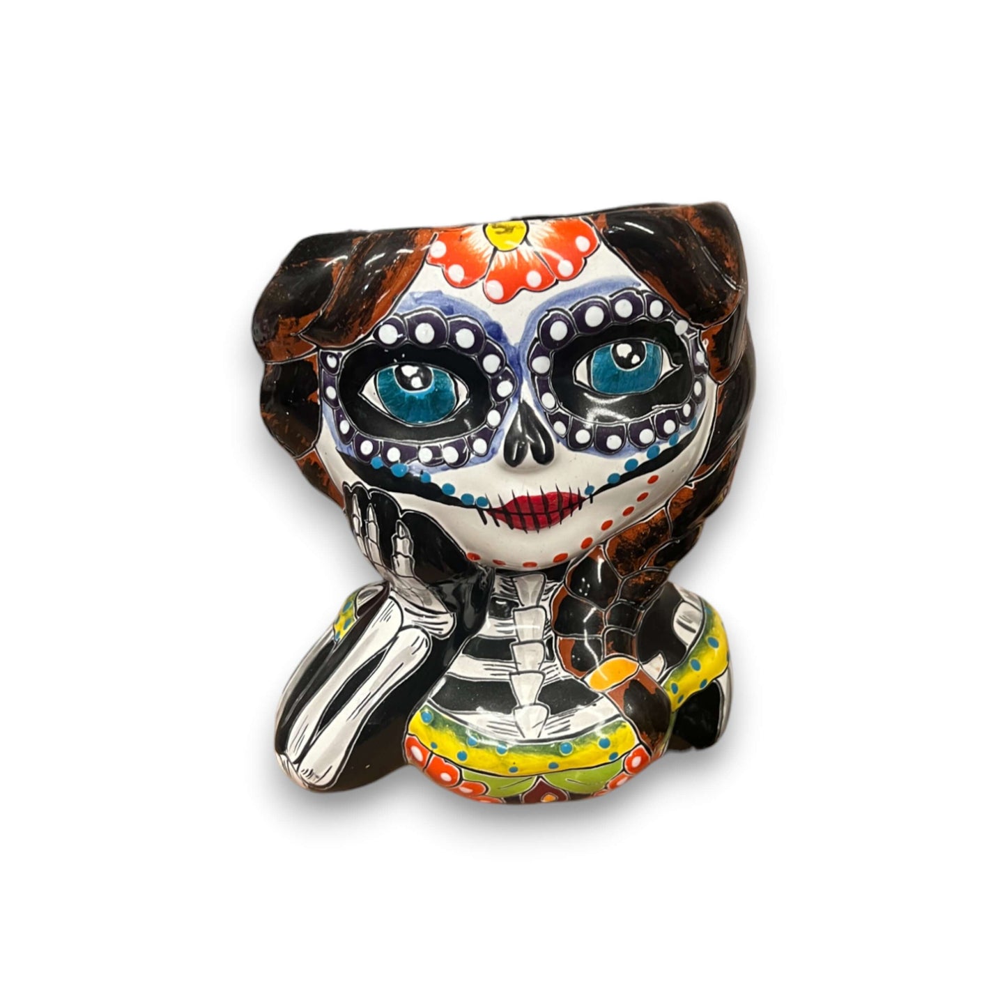 Talavera Skull Girl Planter | Hand-Painted Day of the Dead Pot – hand-painted Talavera seated skeleton girl planter with braided hair and colorful face paint