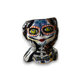 Talavera Skull Girl Planter | Hand-Painted Day of the Dead Pot - hand-painted Talavera seated skeleton girl planter with braided hair and colorful face paint