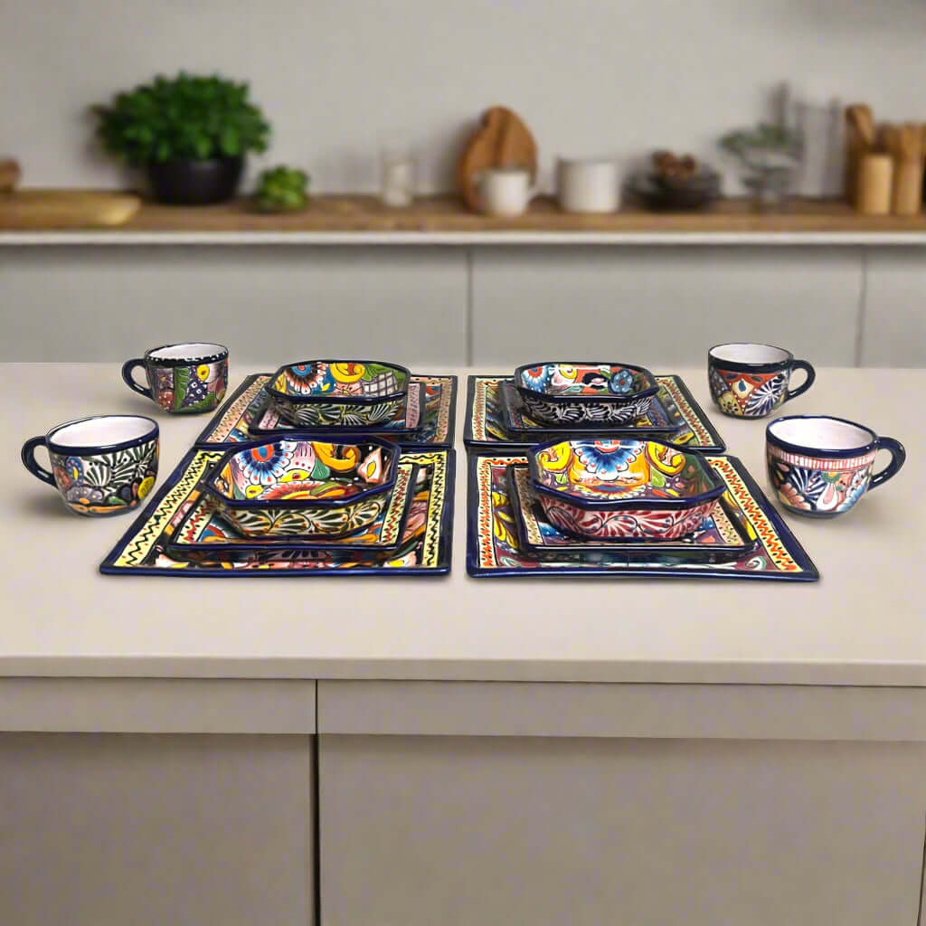 Talavera Square Dinnerware Set | 16-Piece Mexican Pottery Set - hand-painted vibrant square plates, bowls and mugs on kitchen counter
