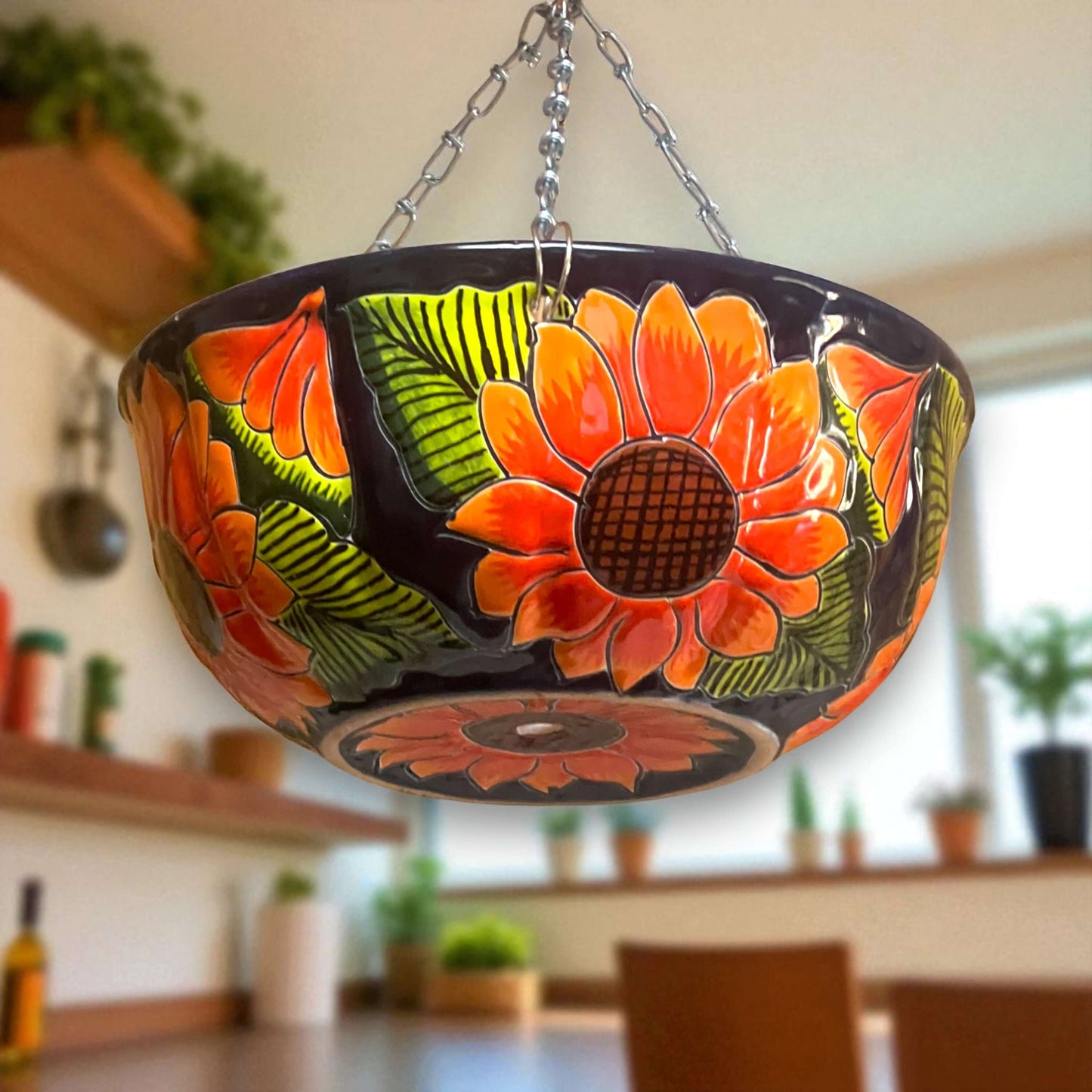 Vibrant Talavera Sunflower Hanging Planter | Artisan Pot hand-painted sunflower hanging ceramic planter with orange petals and green leaves