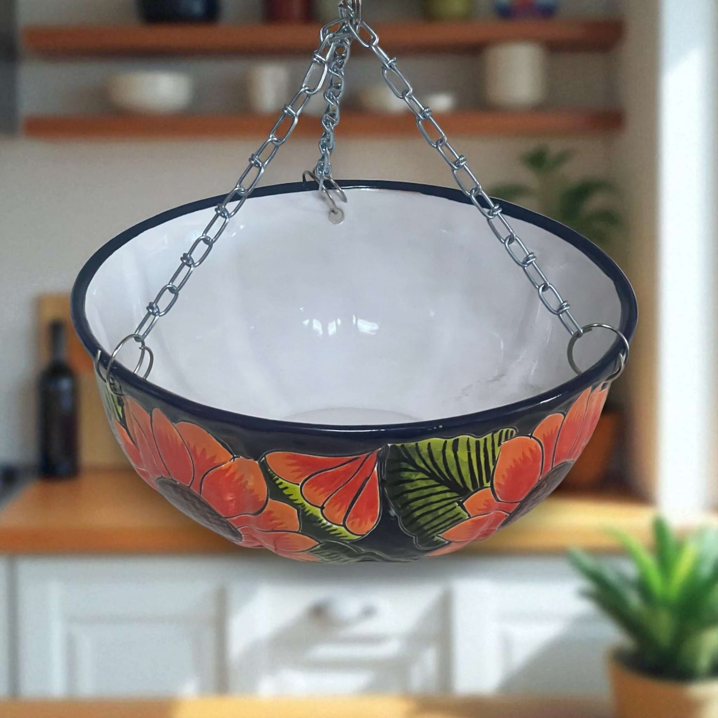Vibrant Talavera Sunflower Hanging Planter | Artisan Pot hand-painted sunflower hanging planter with orange and green hues, kiln-fired, lead-free glaze