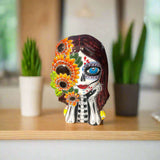 Talavera Sunflower Skull Planter | Handcrafted Day of the Dead Pot - hand-painted Talavera sunflower skull ceramic planter on shelf