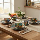 The Talavera Hub 26-piece dinnerware set with vibrant floral Mexican Talavera pottery design. Includes plates, bowls, and mugs.