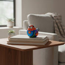 The Talavera Hub handcrafted ceramic Alebrije bird figurine with vibrant hand-painted Mexican folk art patterns.
