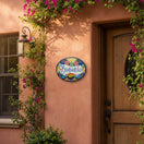 The Talavera Hub hand-painted ceramic Bienvenidos plaque with floral border, 8.25" x 10.25".