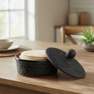The Talavera Hub black ceramic tortilla keeper with floral motifs, 6" tall, 7.5" diameter.